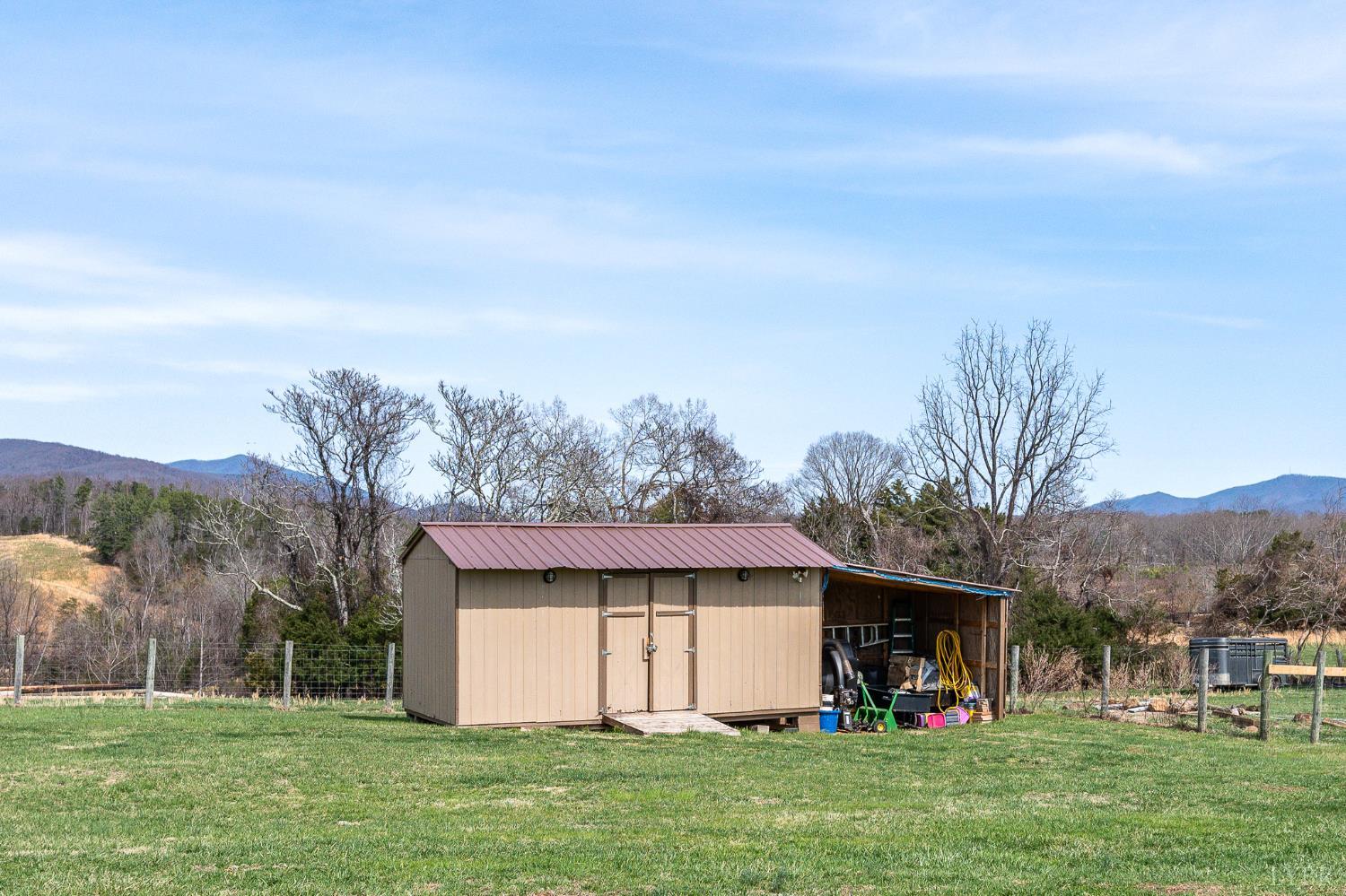 1925 Forbes Mill Road Bedford, VA 24523 - Photo 55 of 58 a view of a back yard of the house with a yard