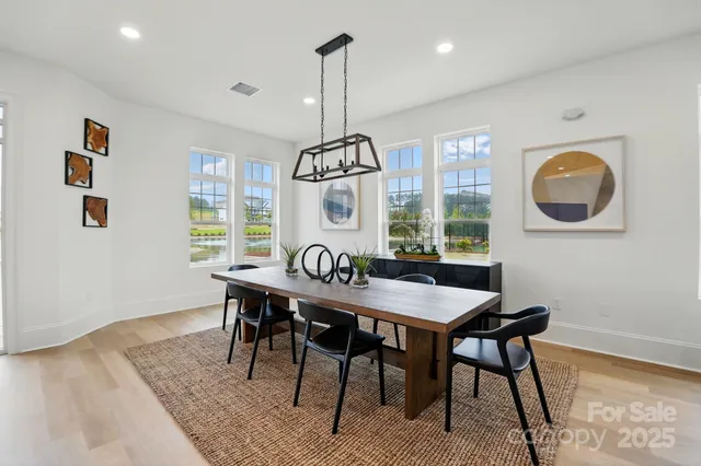 a view of a dining room and chandelier