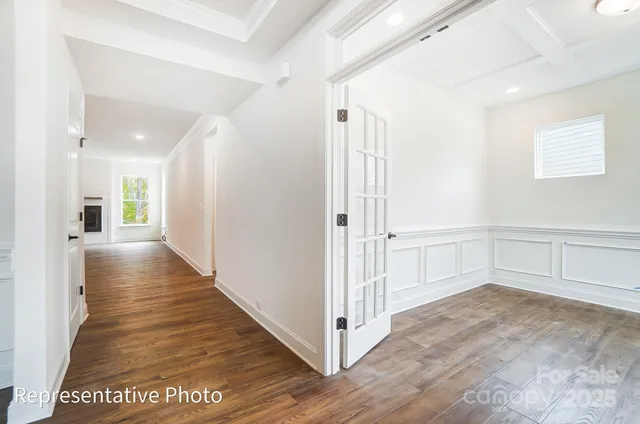 a view of a hallway with a white walls