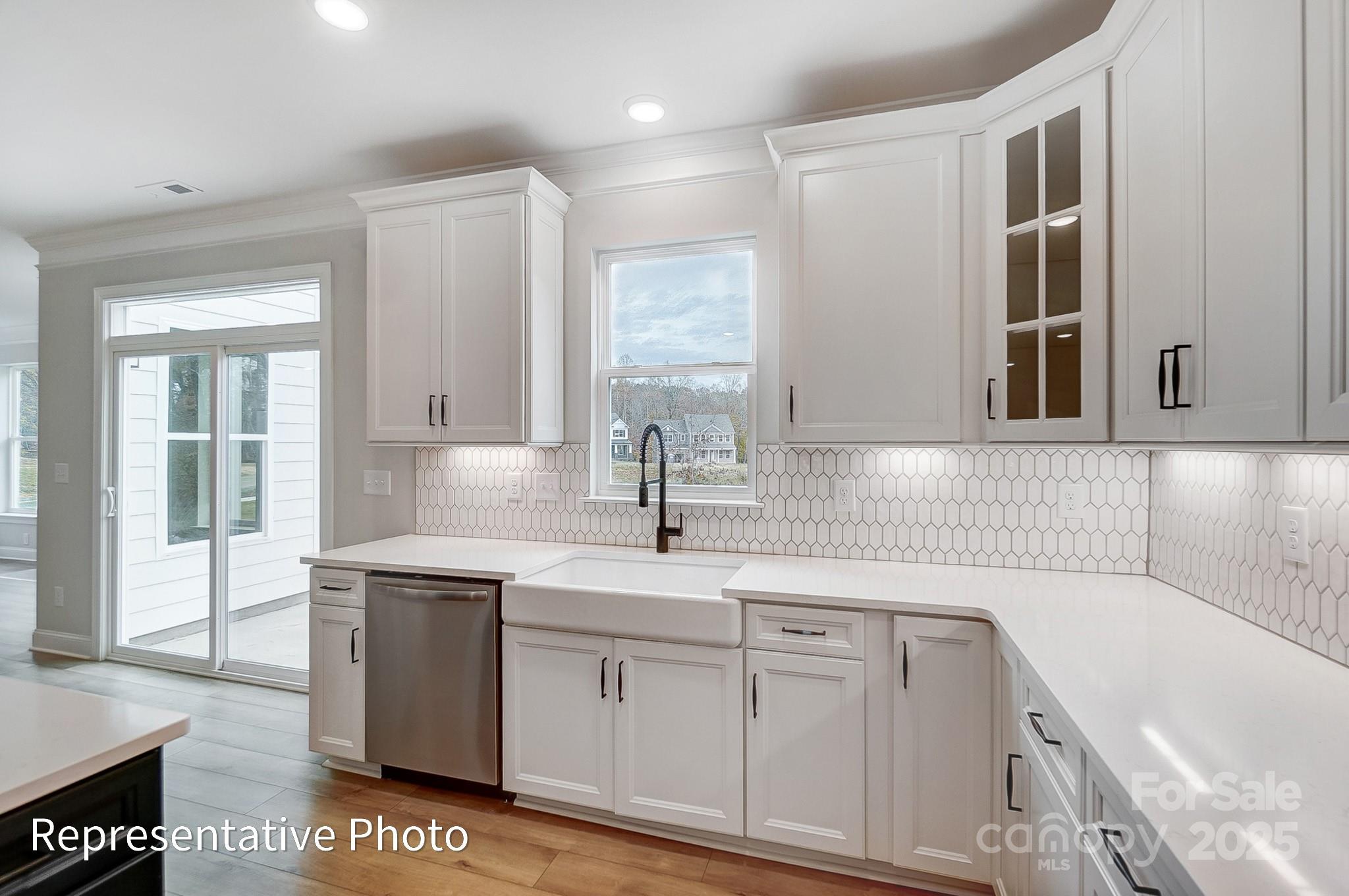 2241 Tabor Road Sherrills Ford, NC 28673 - Photo 7 of 38 a kitchen with a sink and cabinets