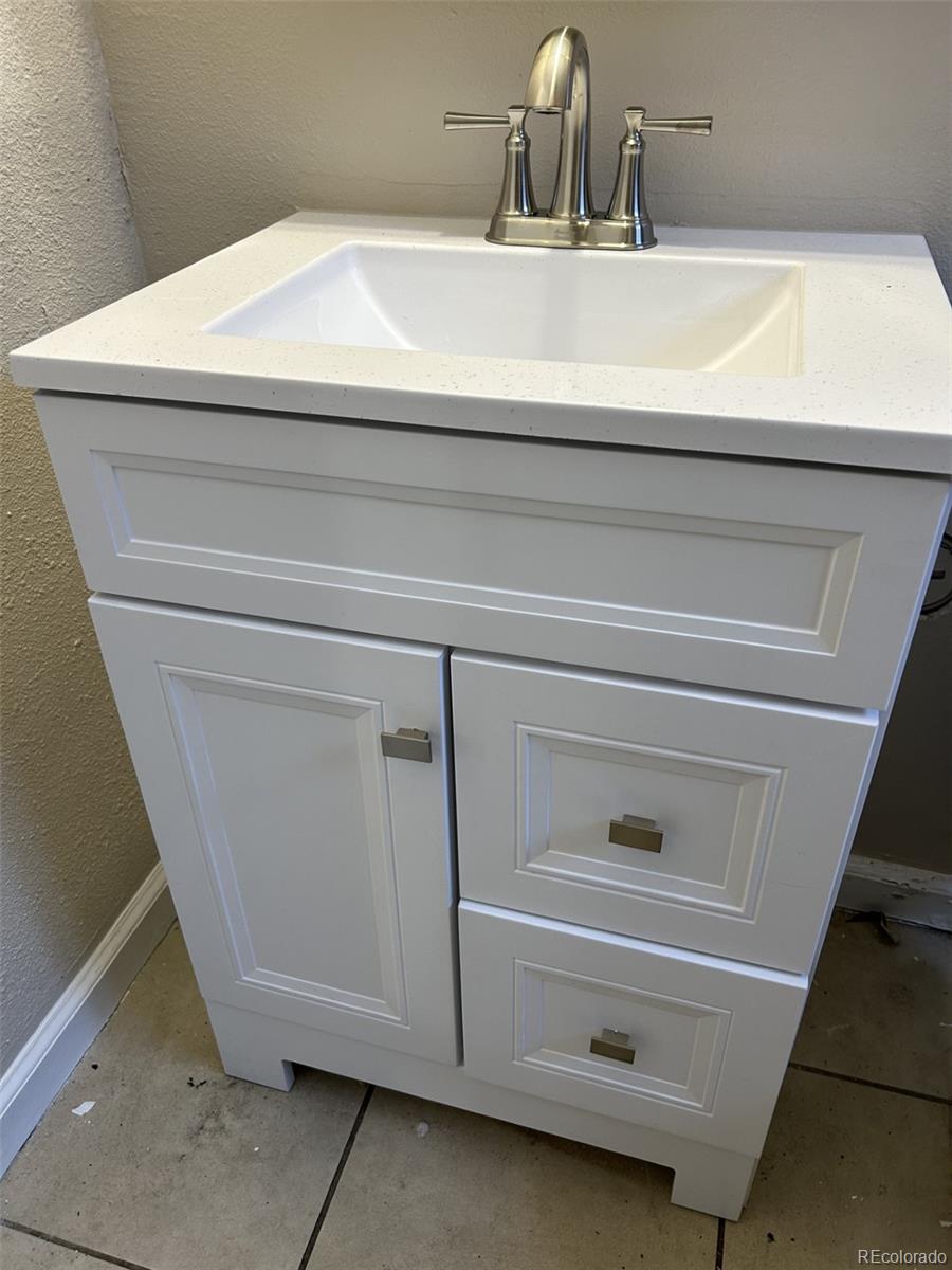 1476 Boston Street Aurora, CO 80010 - Photo 7 of 14 a close view of vanity