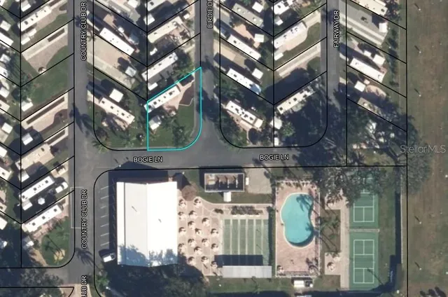 a front view of a house with garden and plants