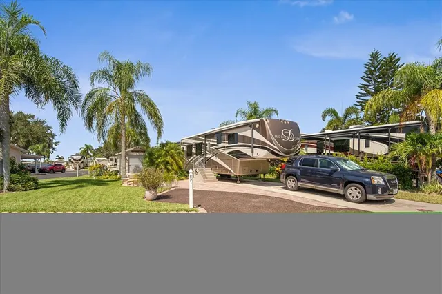 a view of a street with a car parked in front of it