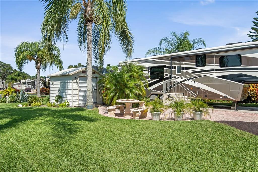 2911 Birdie Drive, Unit 85 Bowling Green, FL 33834 - Photo 5 of 16 a front view of a house with a yard