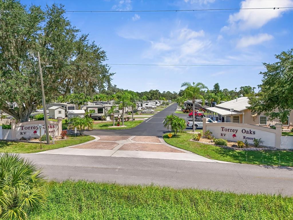 2911 Birdie Drive, Unit 85 Bowling Green, FL 33834 - Photo 9 of 16 a view of a street with houses on both side