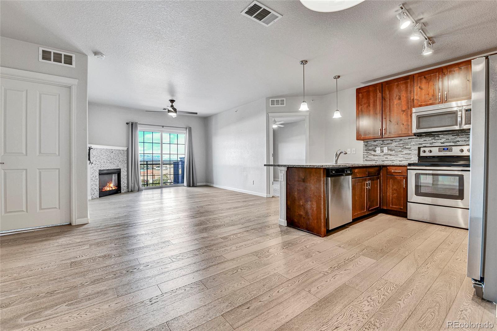 9258 Rockhurst Street, Unit 402 Highlands Ranch, CO 80129 - Photo 4 of 25