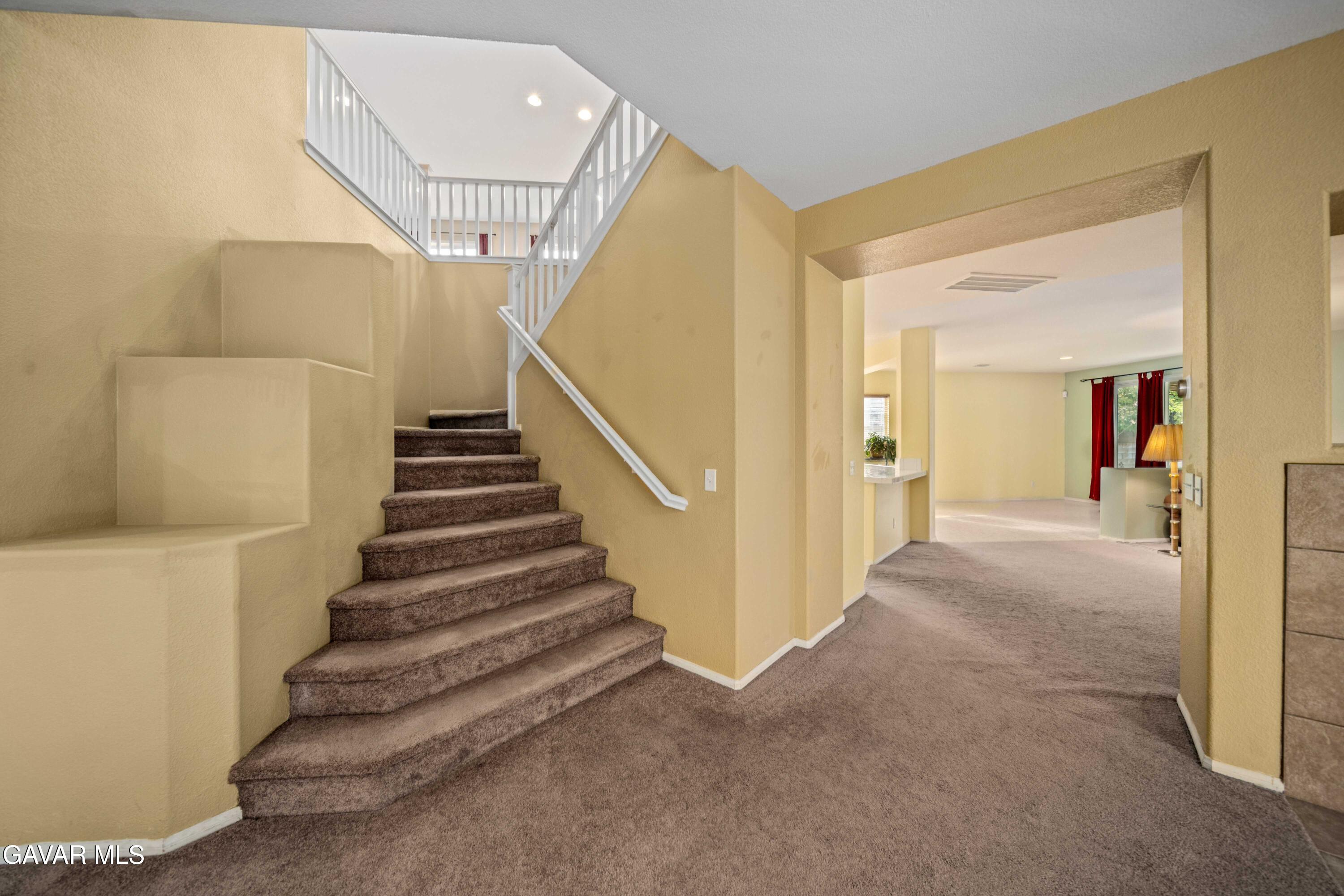 43219 Fanchon Avenue Lancaster, CA 93536 - Photo 23 of 51 a view of a hallway with staircase