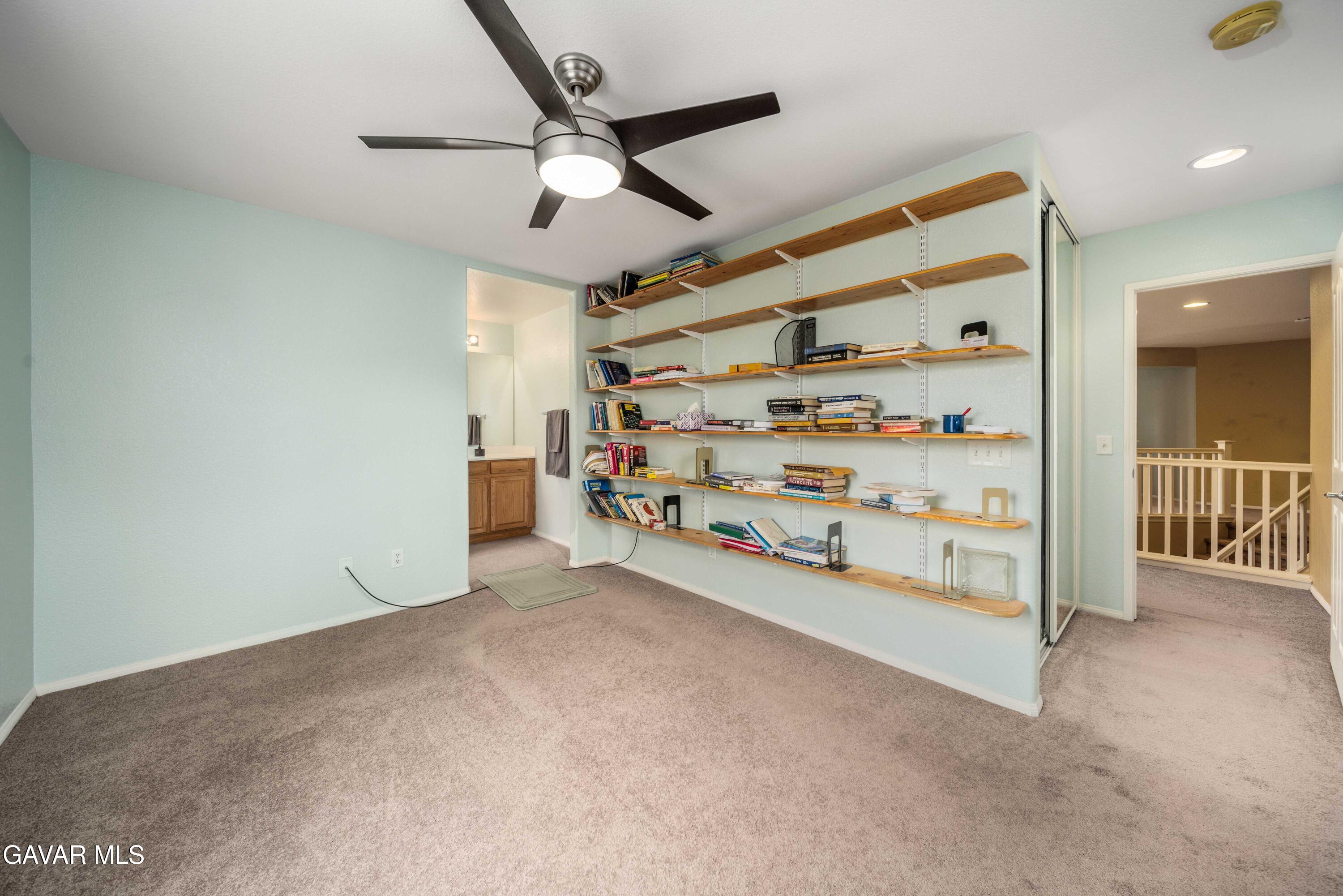 43219 Fanchon Avenue Lancaster, CA 93536 - Photo 25 of 51 a view of empty room with cabinet and ceiling fan