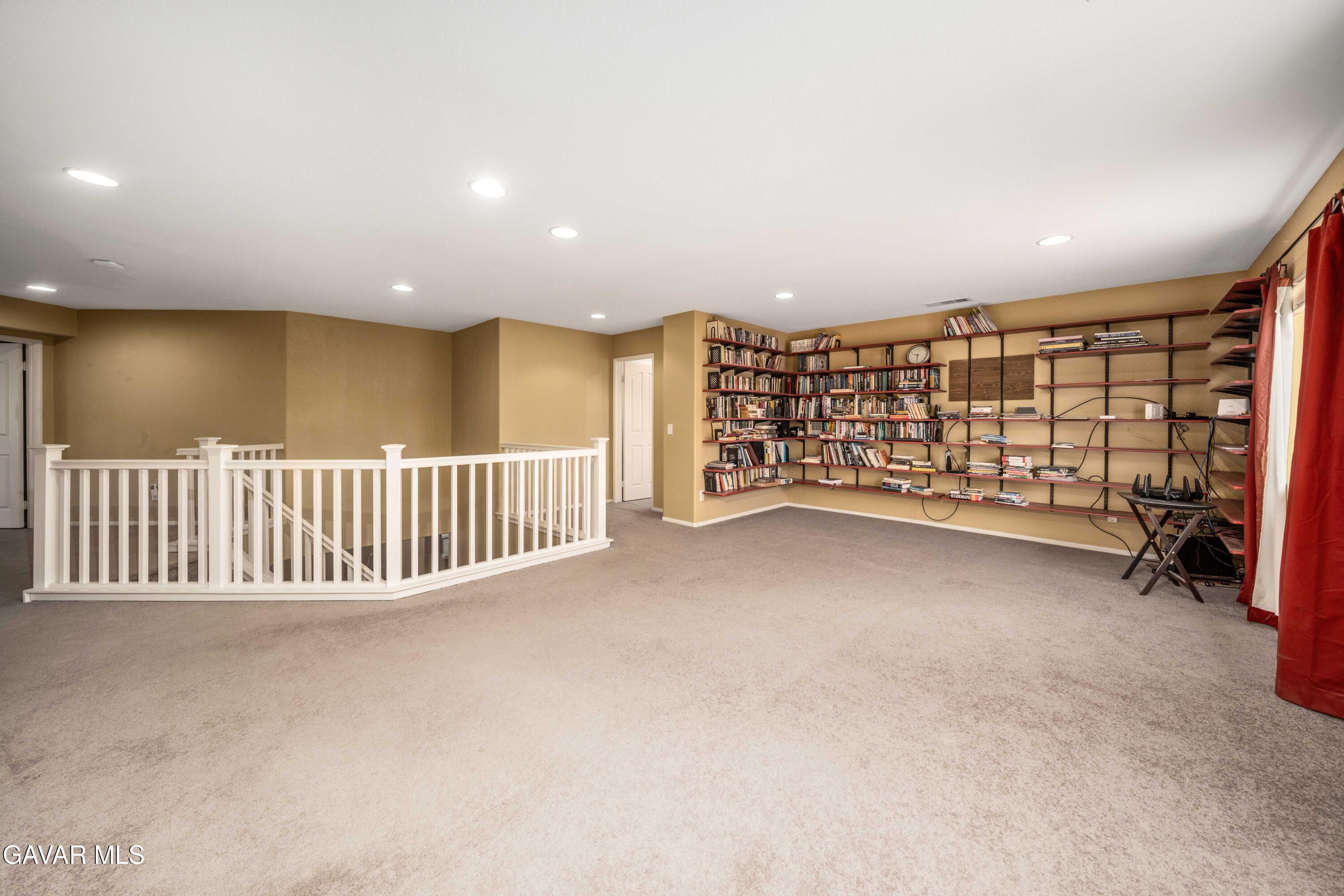 43219 Fanchon Avenue Lancaster, CA 93536 - Photo 29 of 51 a view of an empty room with a staircase