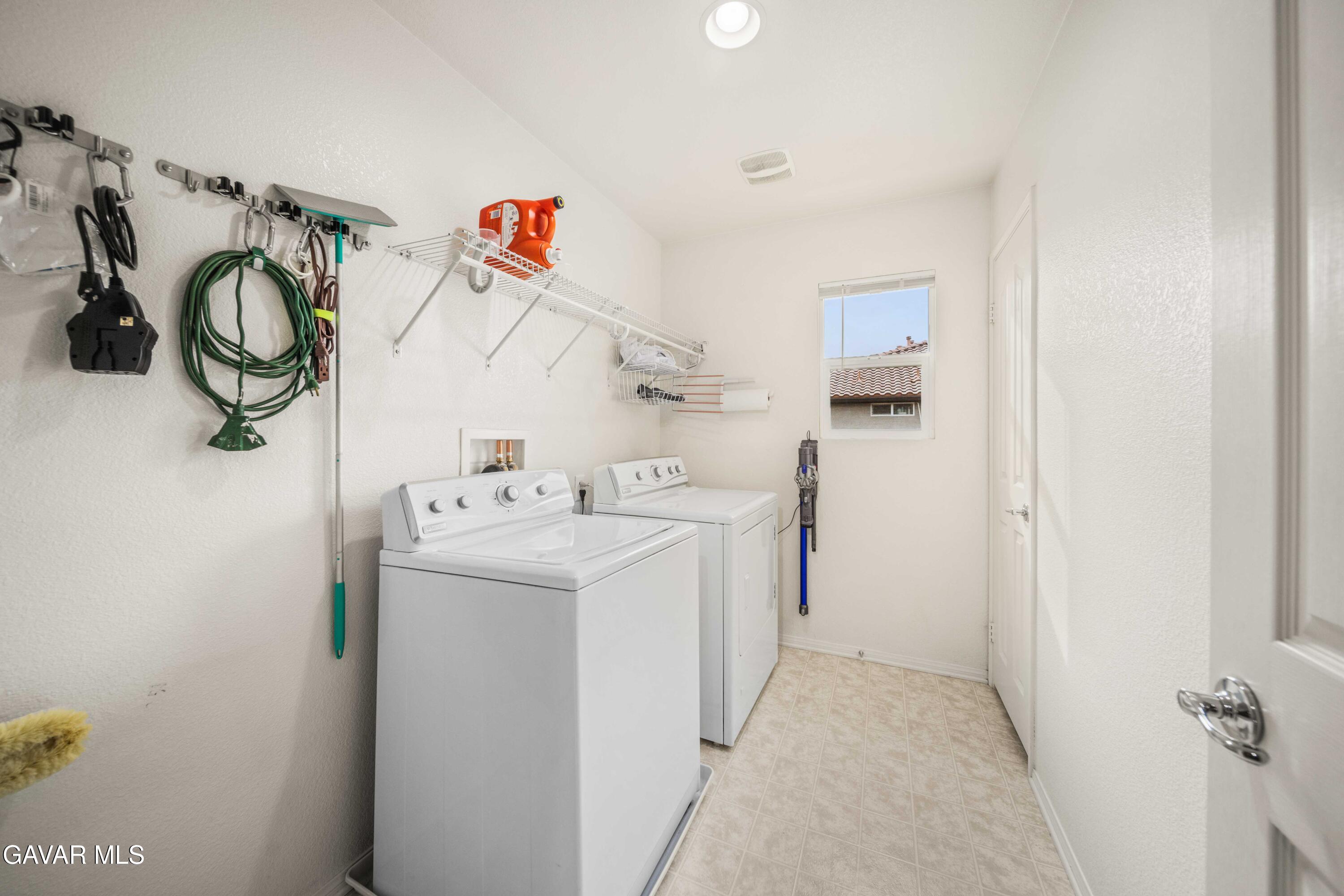 43219 Fanchon Avenue Lancaster, CA 93536 - Photo 36 of 51 a utility room with dryer and washer