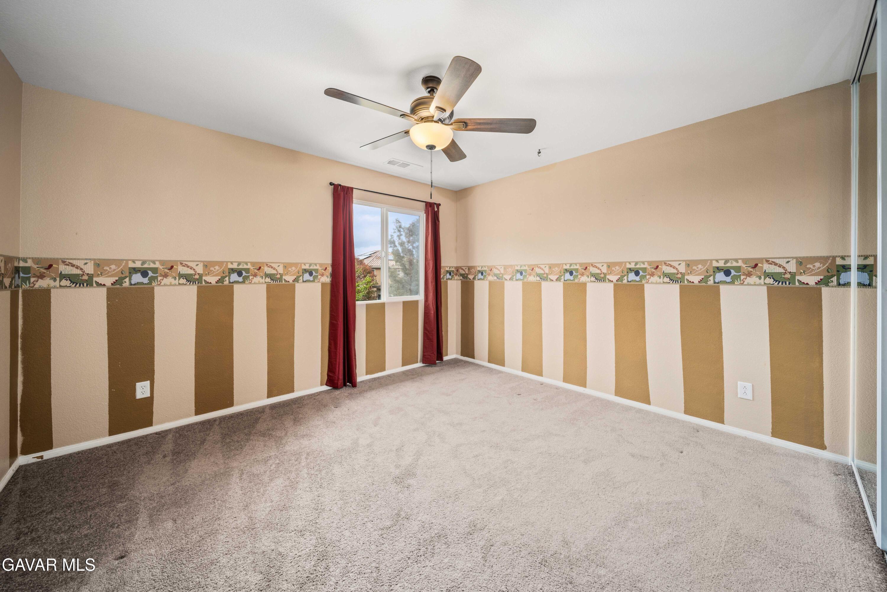 43219 Fanchon Avenue Lancaster, CA 93536 - Photo 37 of 51 a view of a room with lots of white walls