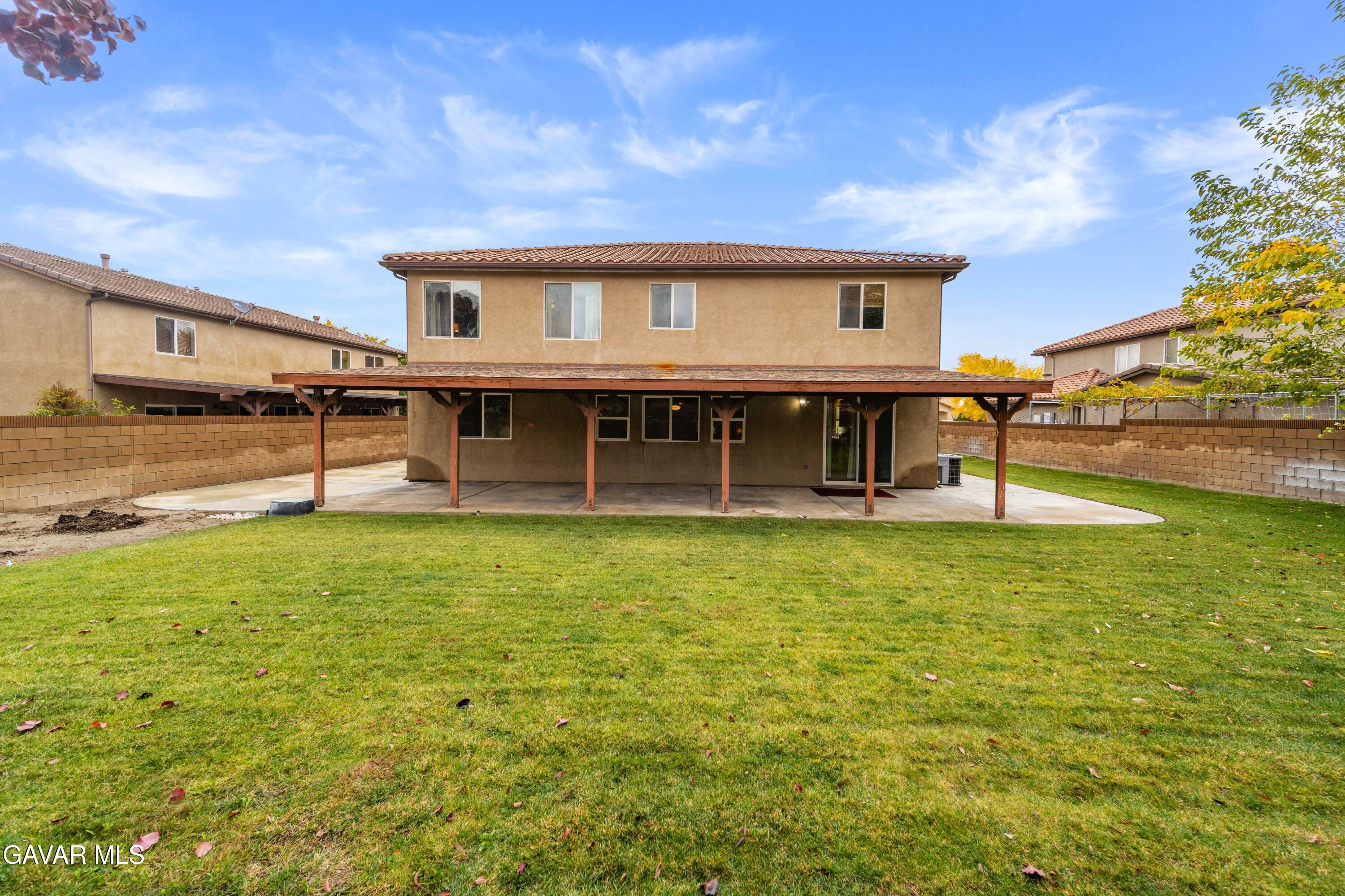43219 Fanchon Avenue Lancaster, CA 93536 - Photo 44 of 51 a view of an house with backyard space and balcony