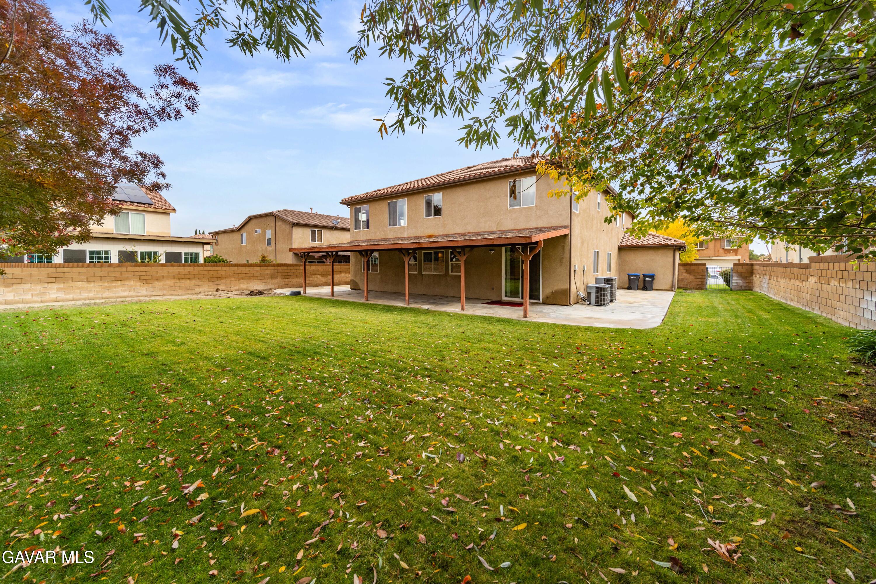 43219 Fanchon Avenue Lancaster, CA 93536 - Photo 46 of 51 a front view of a house with garden