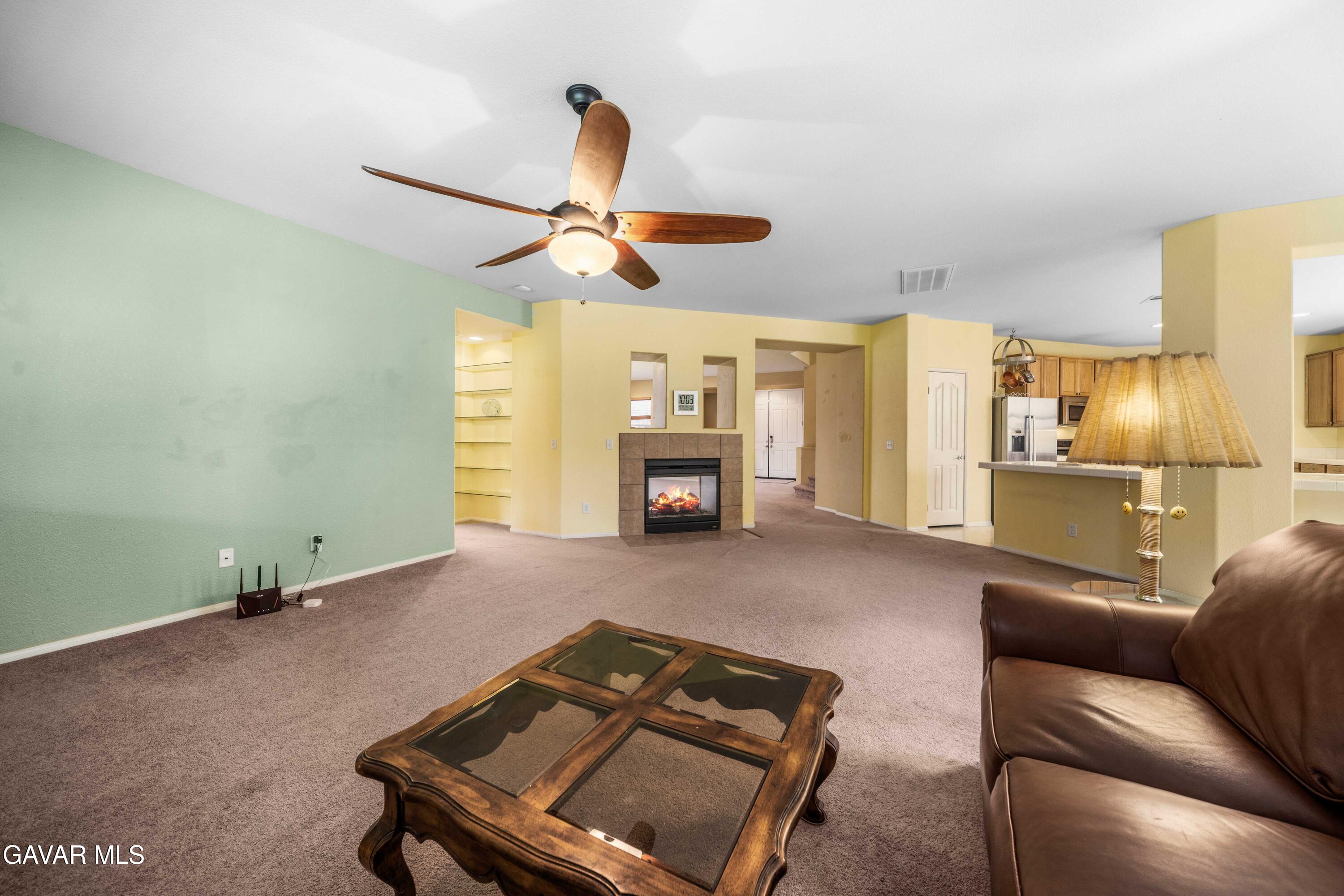 43219 Fanchon Avenue Lancaster, CA 93536 - Photo 9 of 51 a living room with furniture