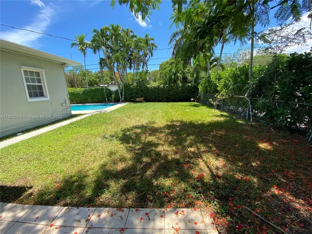 a view of outdoor space and yard