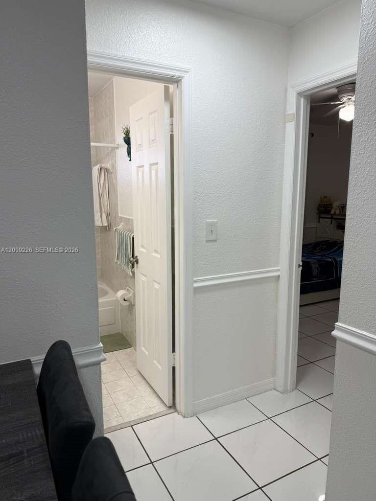 3514 West 76th Street, Unit 203 Hialeah, FL 33018 - Photo 20 of 39 a bathroom with a sink and a mirror