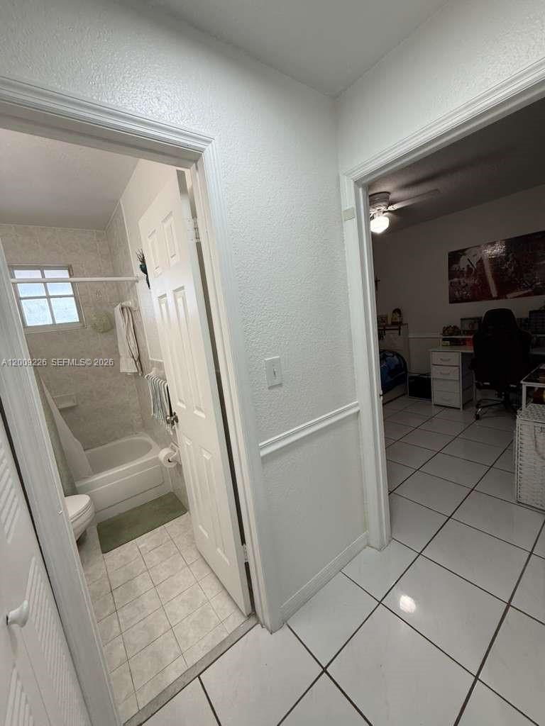 3514 West 76th Street, Unit 203 Hialeah, FL 33018 - Photo 37 of 39 a view of entryway with furniture and front door