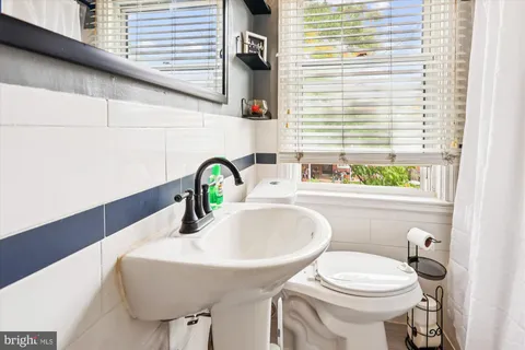 a bathroom with a sink and a toilet