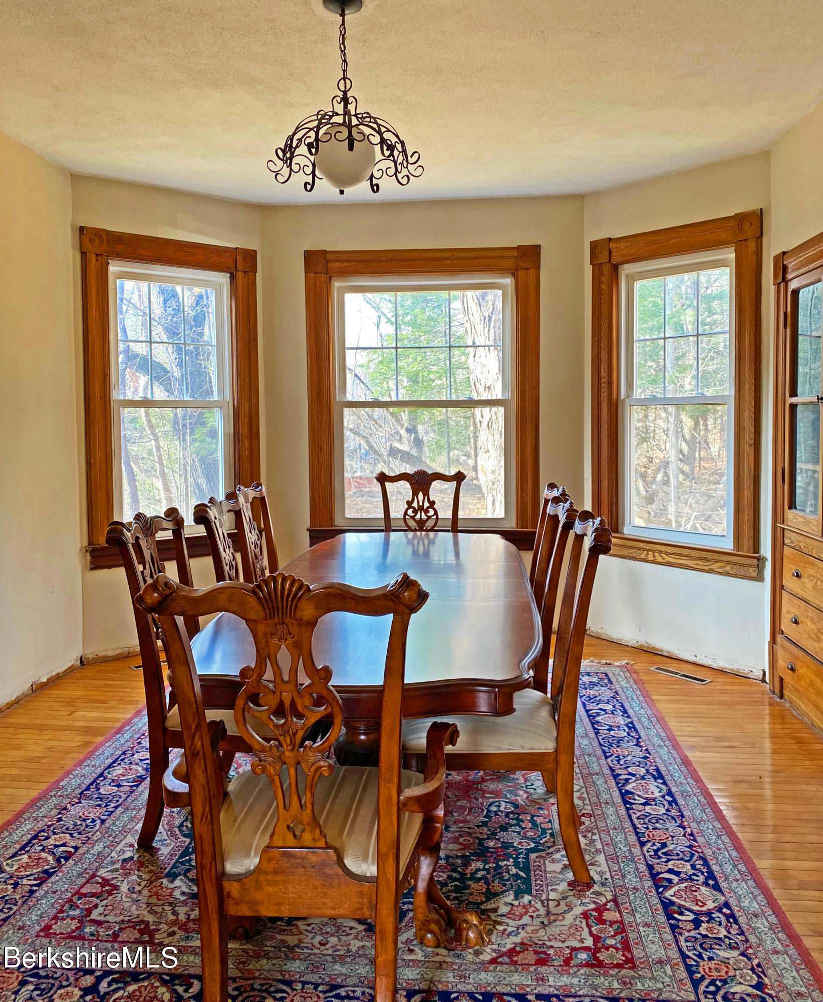 13 Old Chester Road Huntington, MA 01050 - Photo 11 of 26 a view of a dining room with furniture window and wooden floor