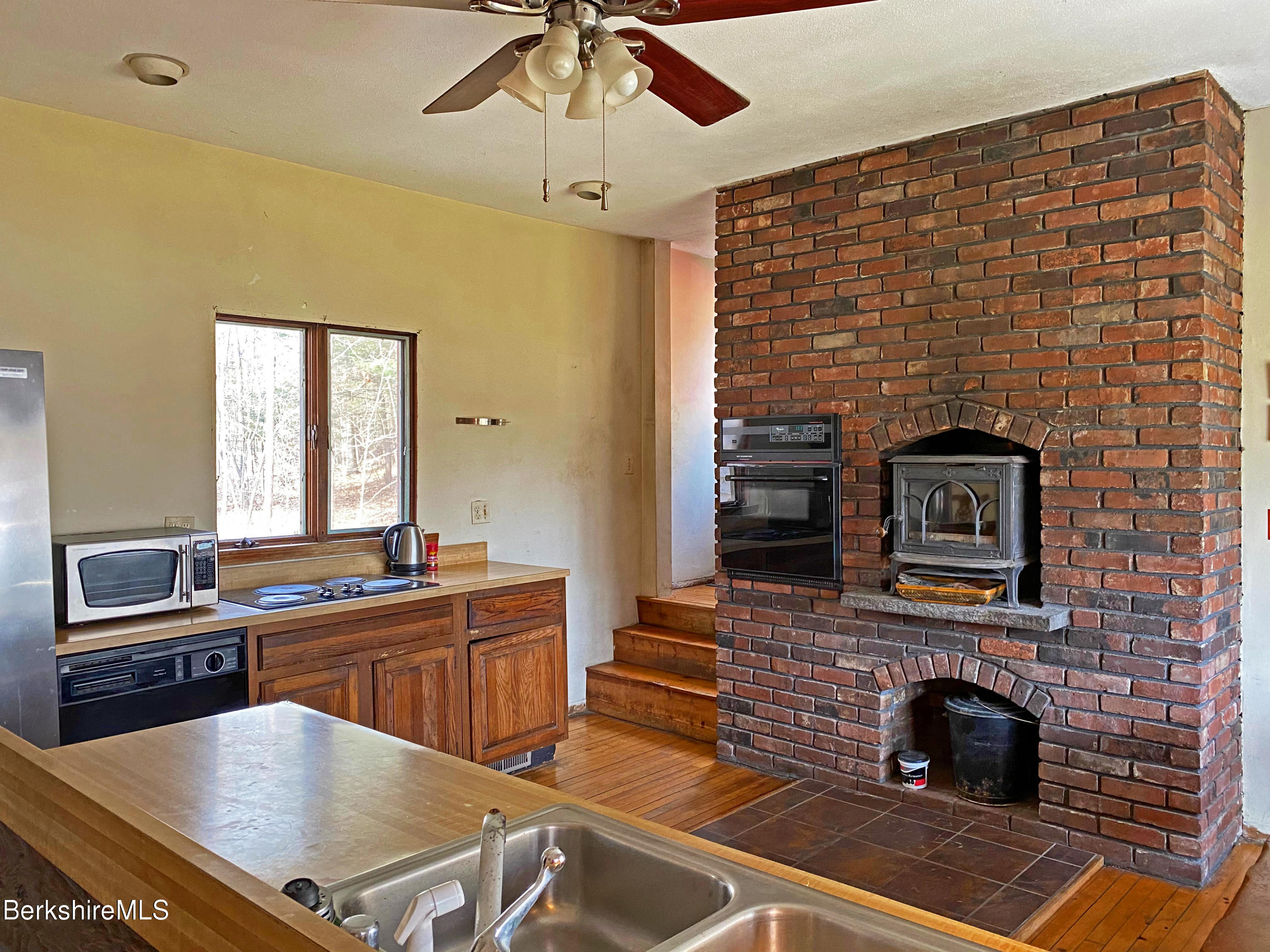 13 Old Chester Road Huntington, MA 01050 - Photo 15 of 26 a kitchen with stainless steel appliances a stove and a sink