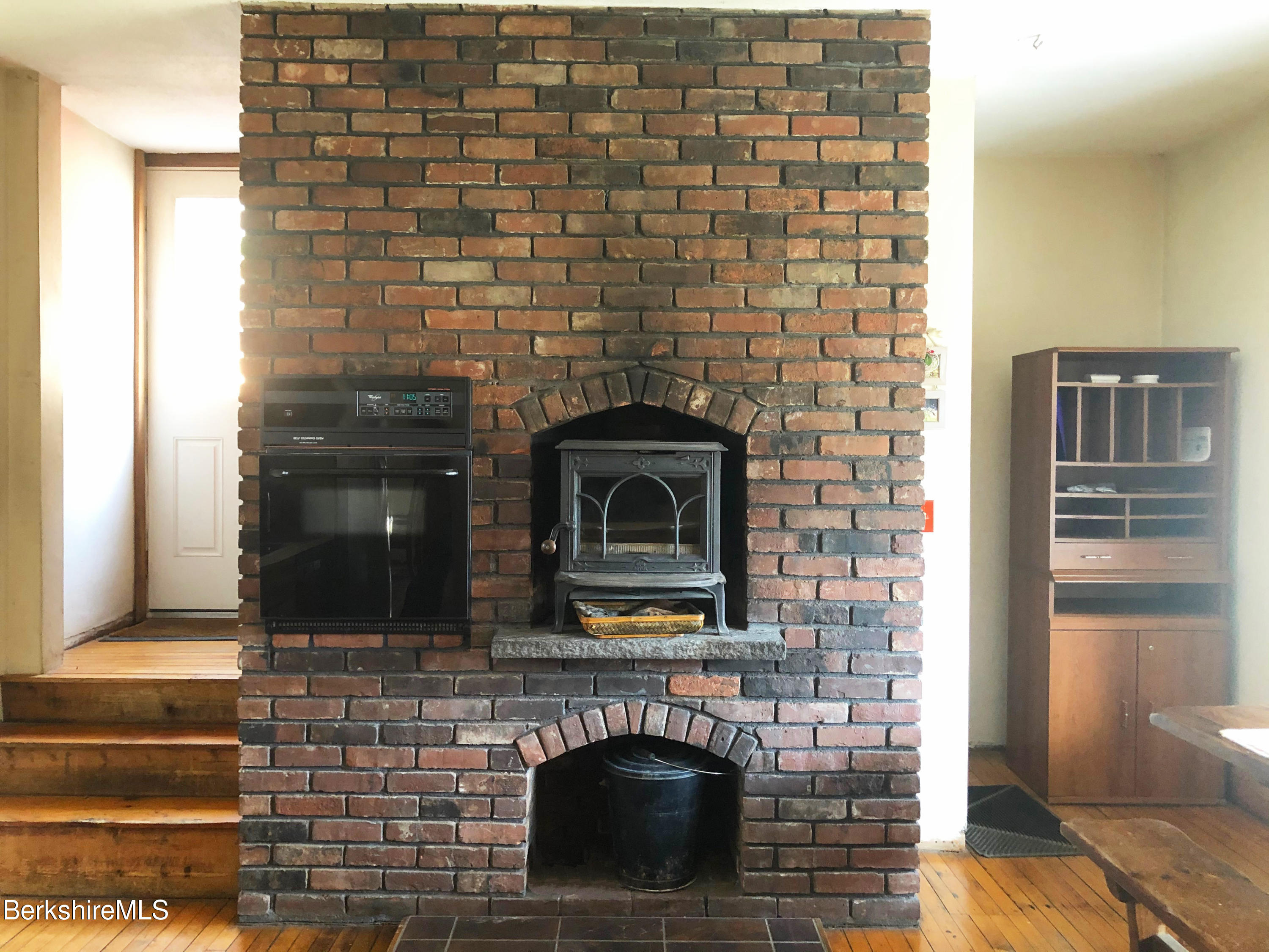 13 Old Chester Road Huntington, MA 01050 - Photo 16 of 26 a living room with a fireplace