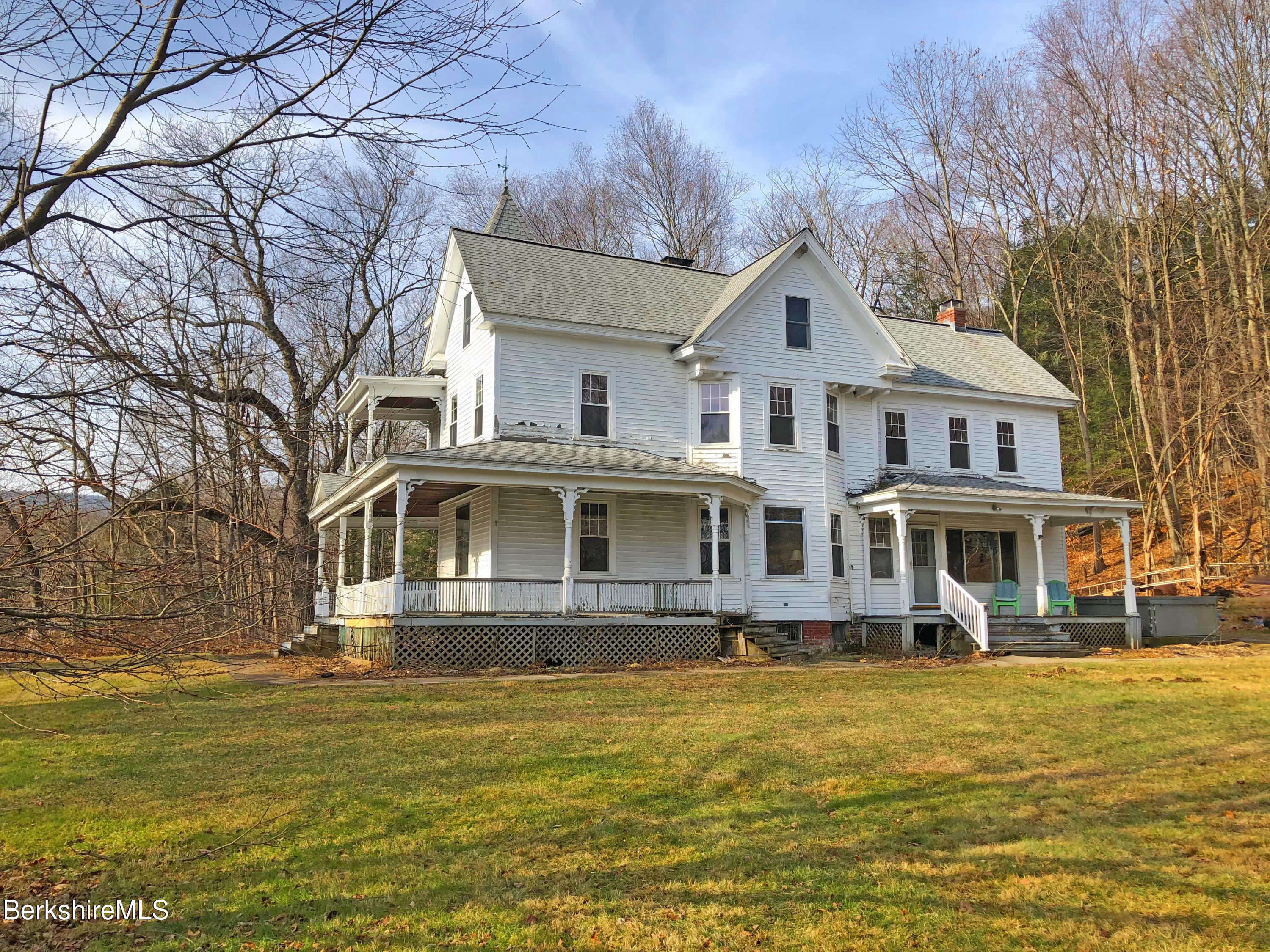 13 Old Chester Road Huntington, MA 01050 - Photo 4 of 26 a front view of a house with swimming pool and porch