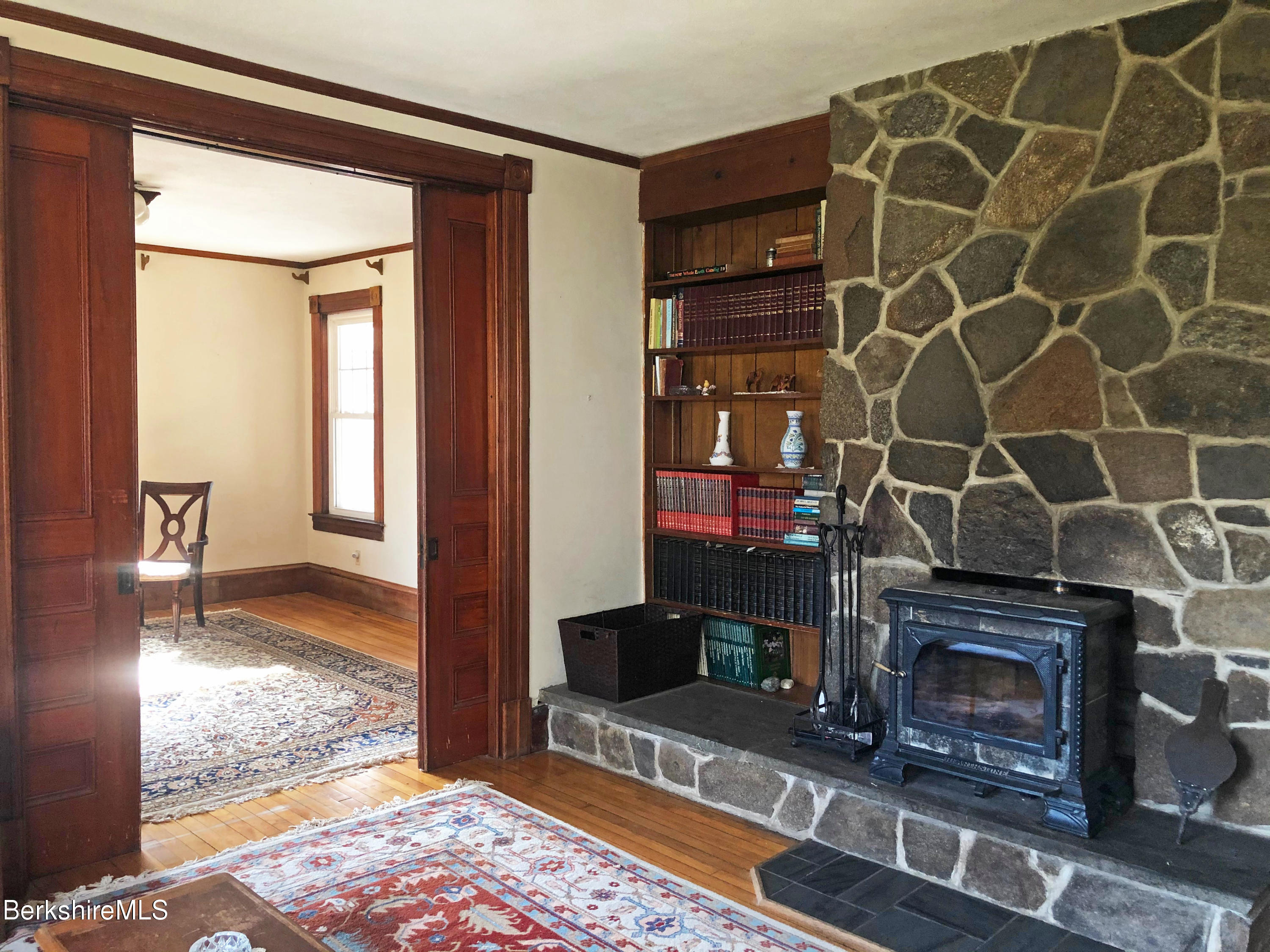 13 Old Chester Road Huntington, MA 01050 - Photo 9 of 26 a living room with furniture and a fireplace