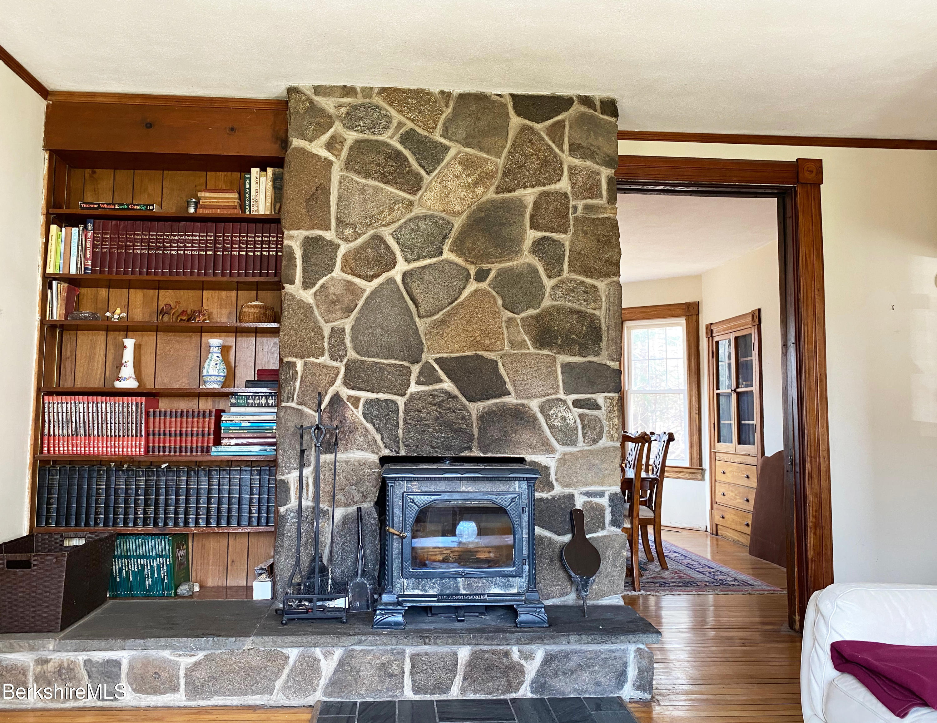 13 Old Chester Road Huntington, MA 01050 - Photo 10 of 26 a living room with furniture and a fireplace