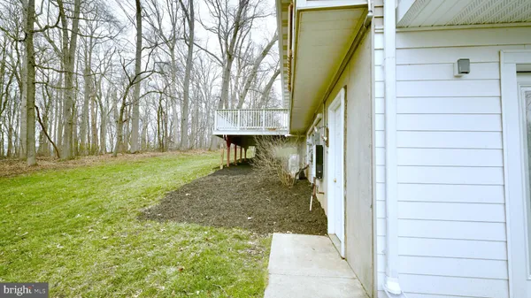 a view of a back yard of the house