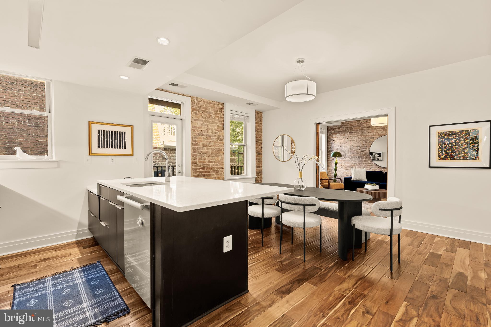1811 Wyoming Avenue Northwest, Unit 32 Washington, DC 20009 - Photo 16 of 26 a view of a living room and dining room