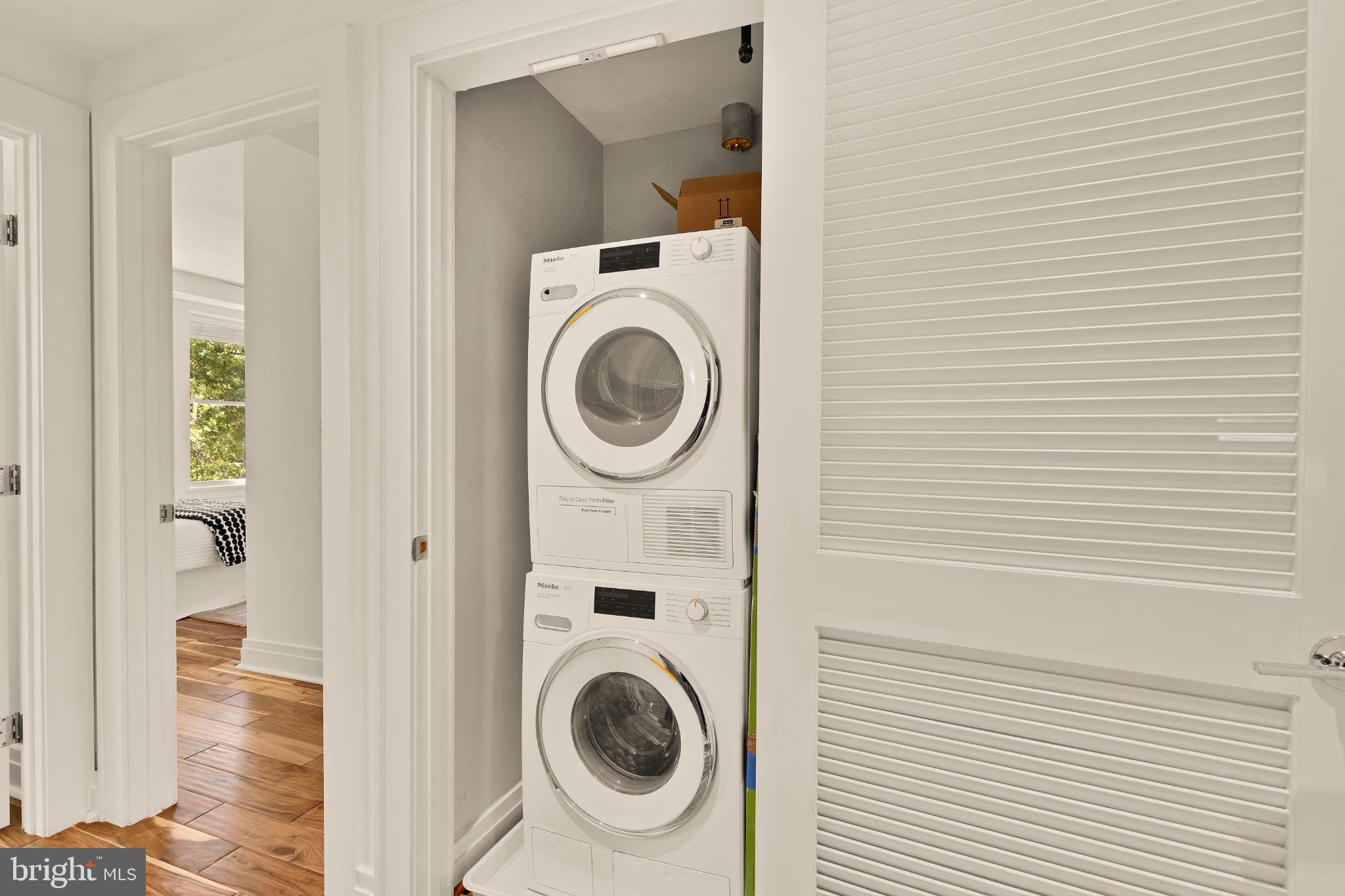 1811 Wyoming Avenue Northwest, Unit 32 Washington, DC 20009 - Photo 23 of 26 a utility room with dryer and washer