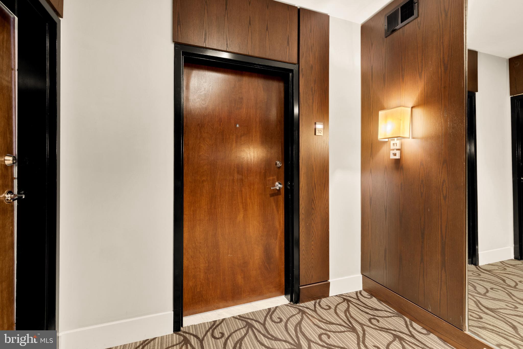 1811 Wyoming Avenue Northwest, Unit 32 Washington, DC 20009 - Photo 3 of 26 a view of bedroom with a bed and wooden floor
