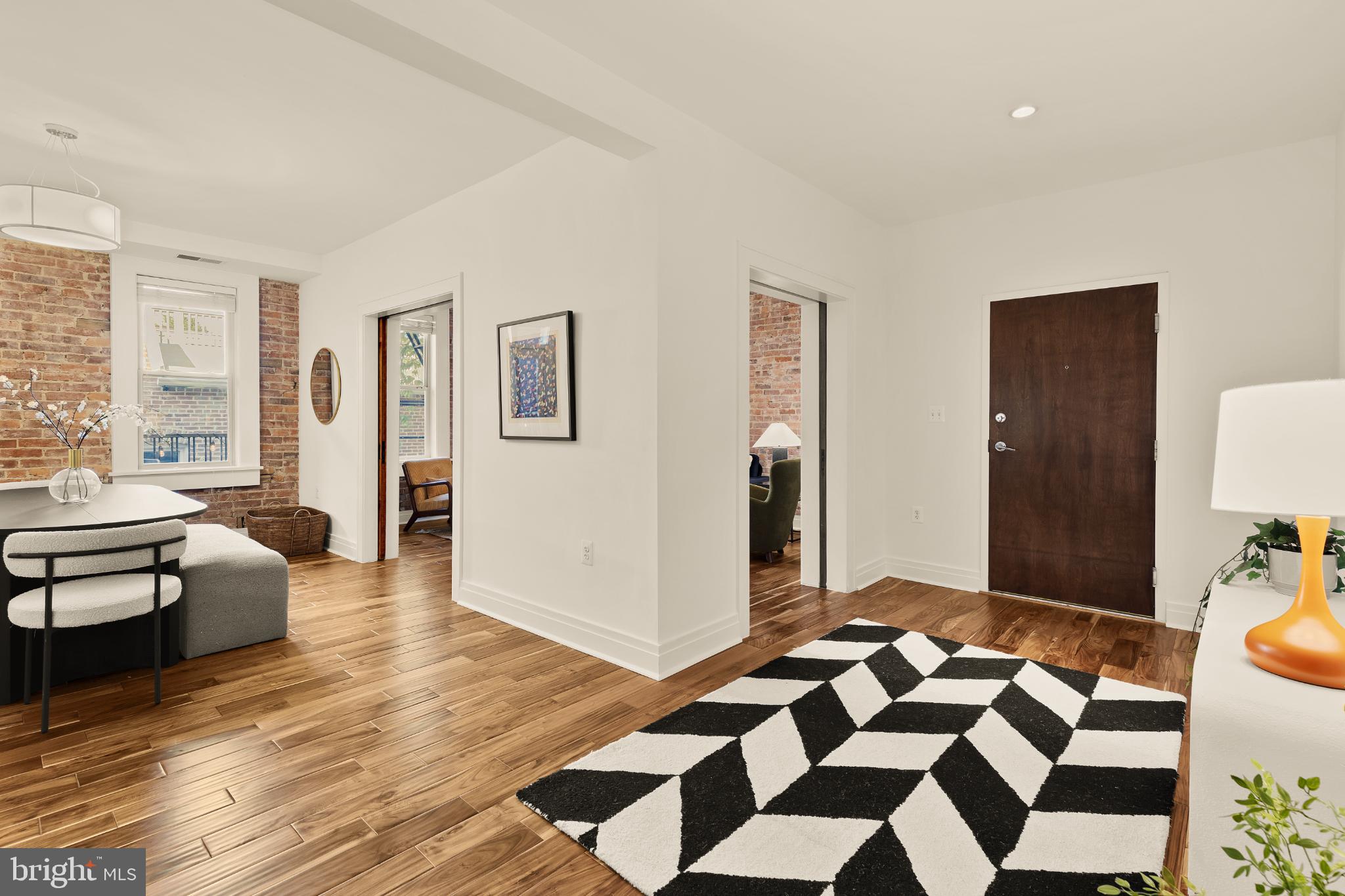 1811 Wyoming Avenue Northwest, Unit 32 Washington, DC 20009 - Photo 6 of 26 a view of a livingroom with furniture and window