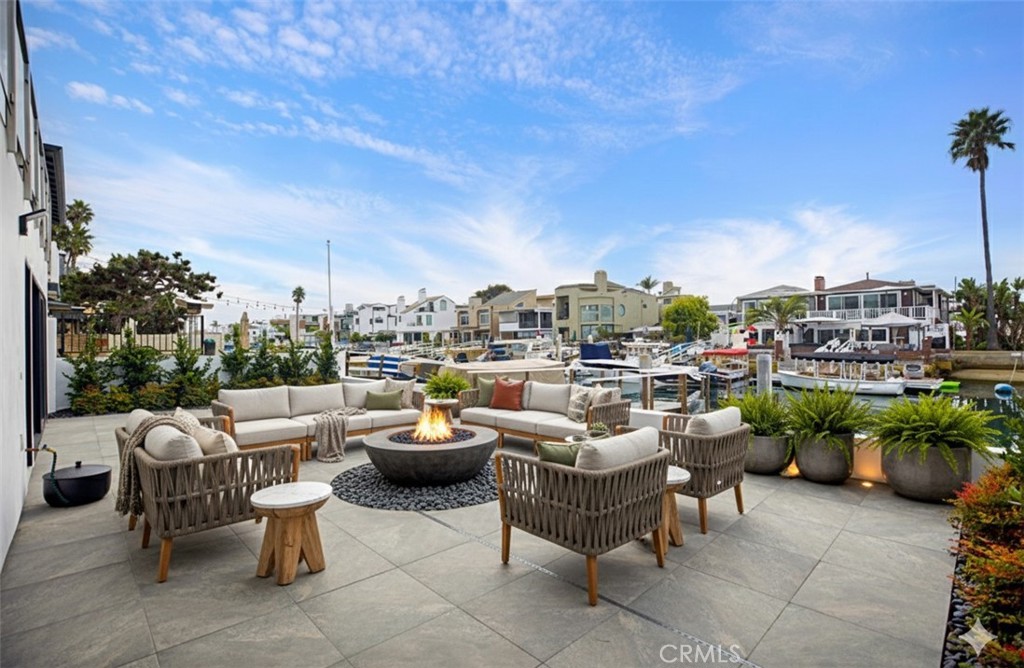 4017 Channel Place, Unit A Newport Beach, CA 92663 - Photo 14 of 18 a view of a patio with couches and chairs