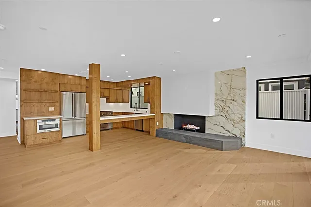 a view of living room with furniture and flat screen tv