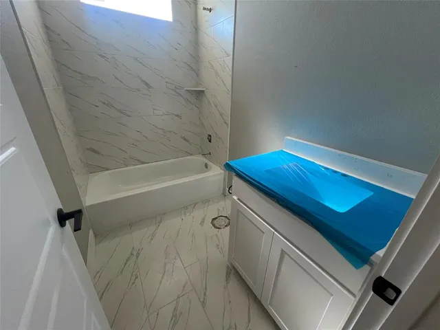 a bathroom with a tub