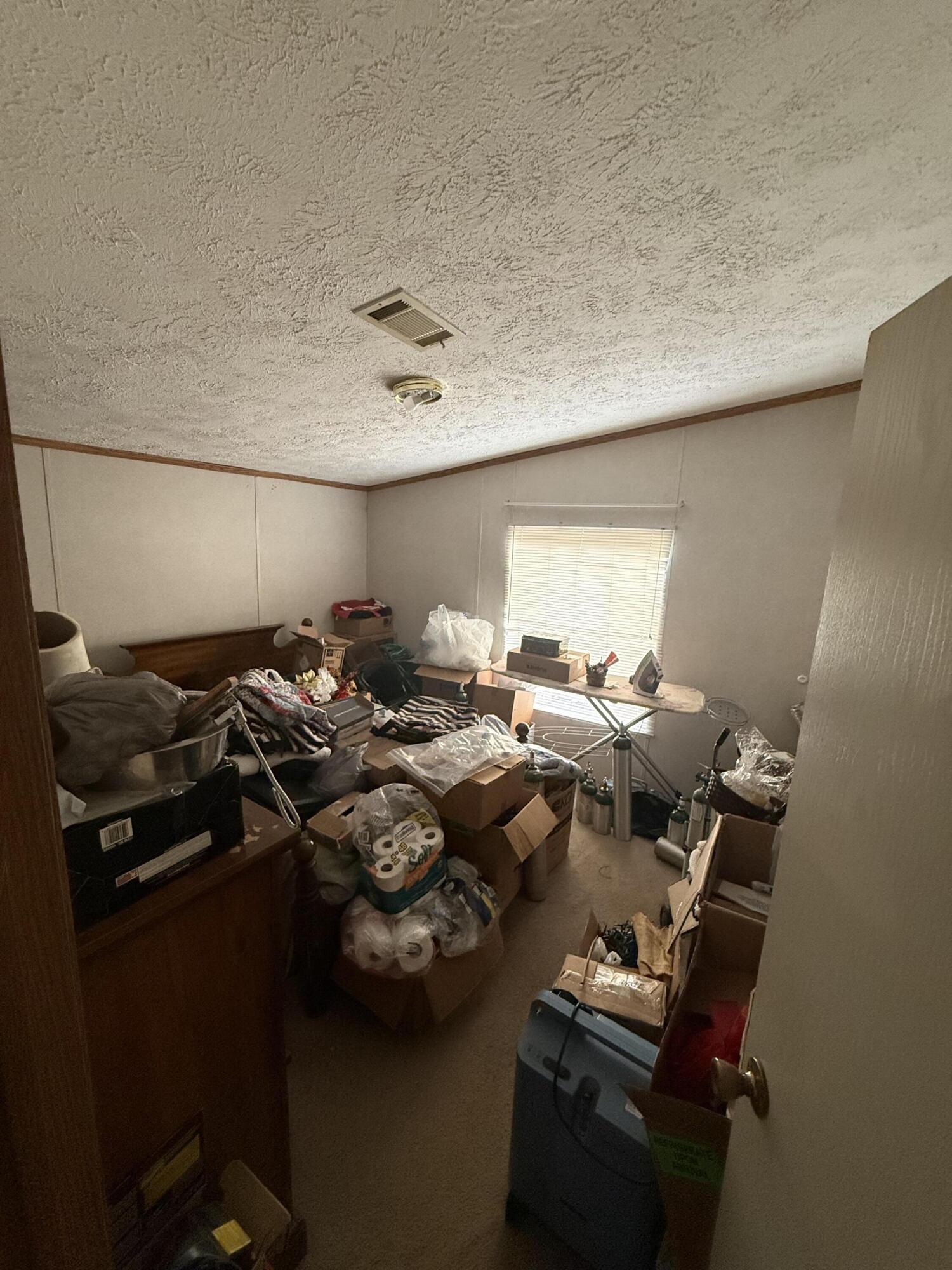 12297 Cooper Road Holt, FL 32564 - Photo 17 of 17 a close up of a fireplace in a room