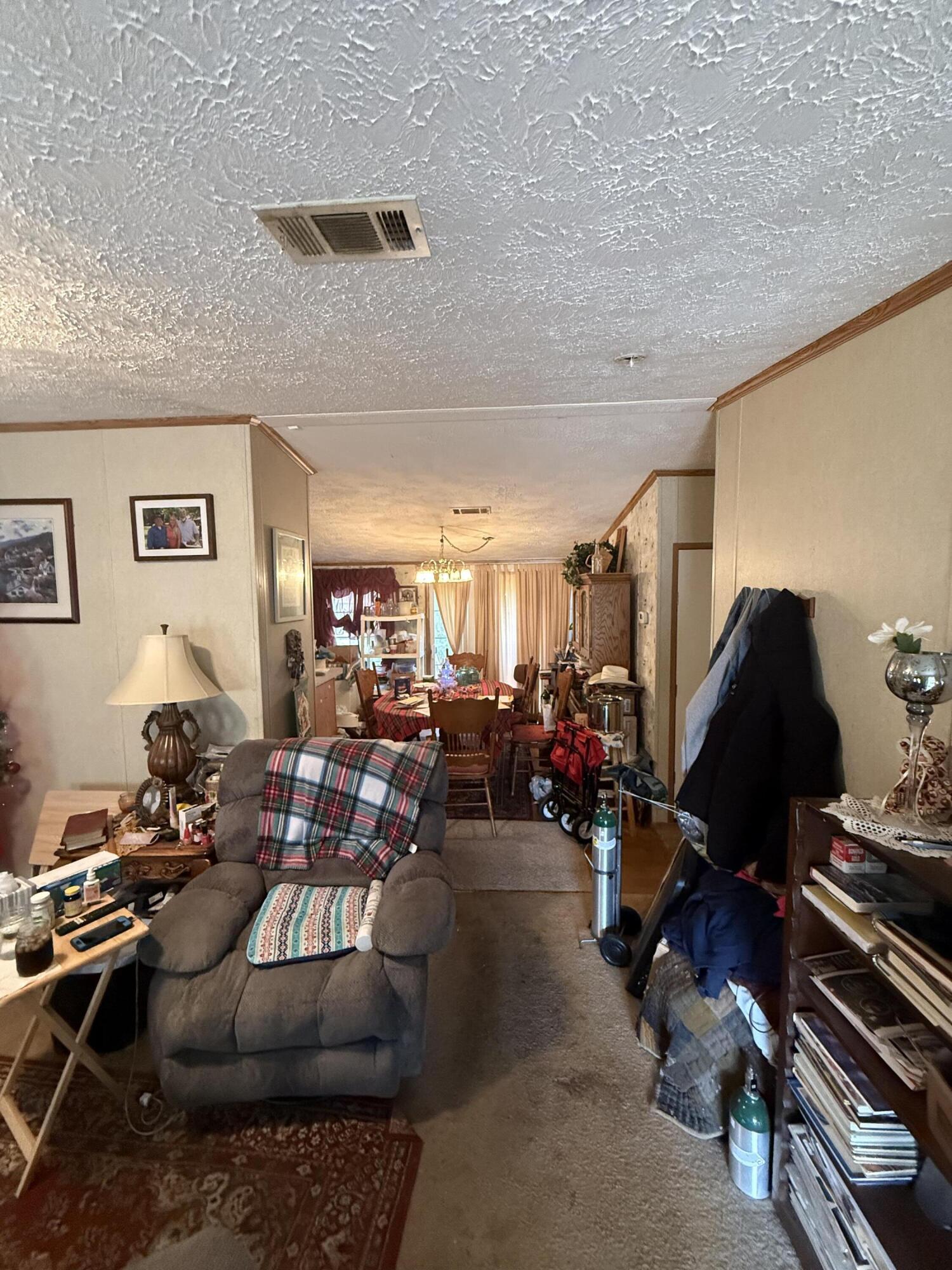 12297 Cooper Road Holt, FL 32564 - Photo 5 of 17 a room with lots of gym equipment