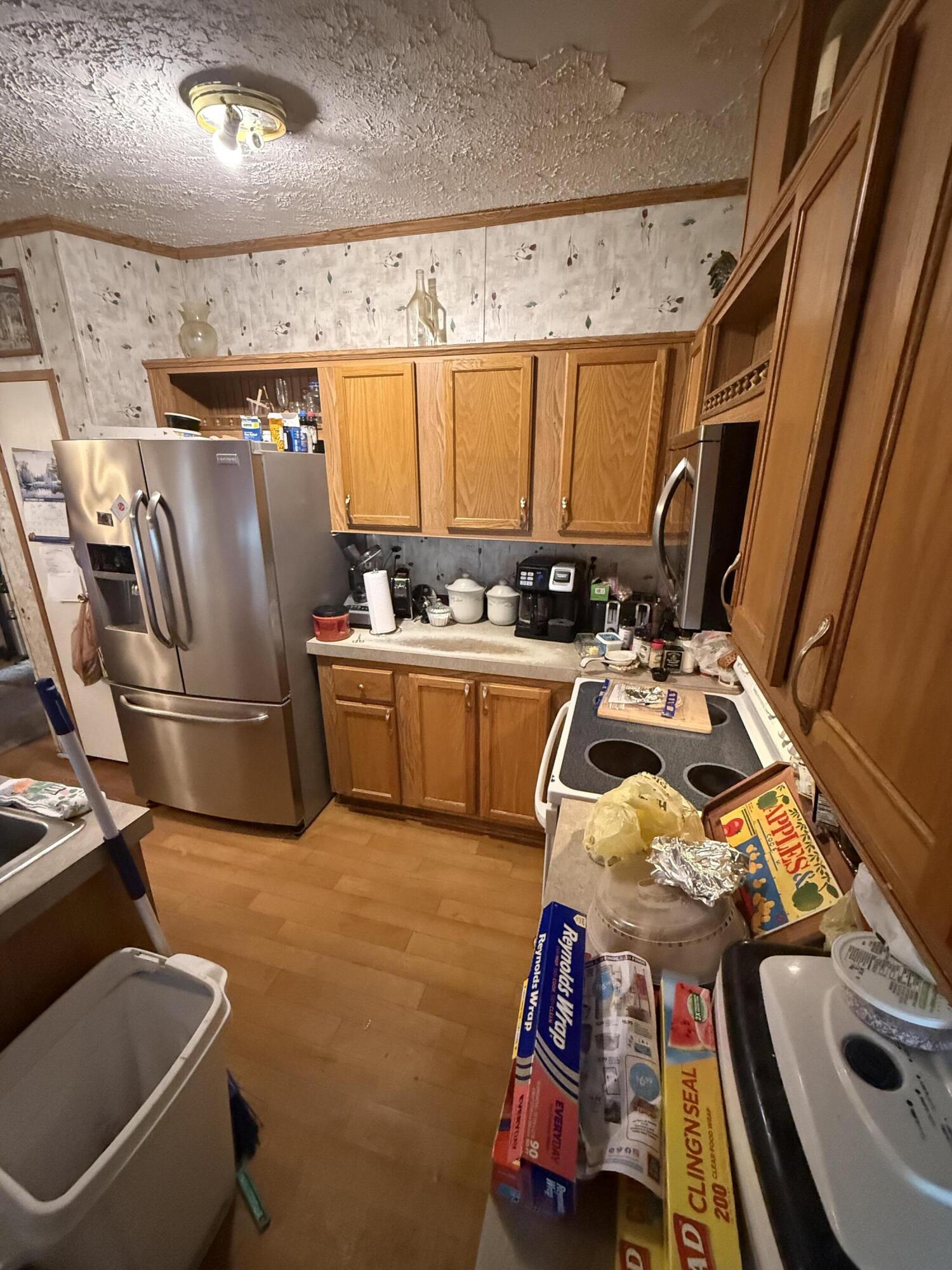 12297 Cooper Road Holt, FL 32564 - Photo 7 of 17 a storage room with sink washer and dryer