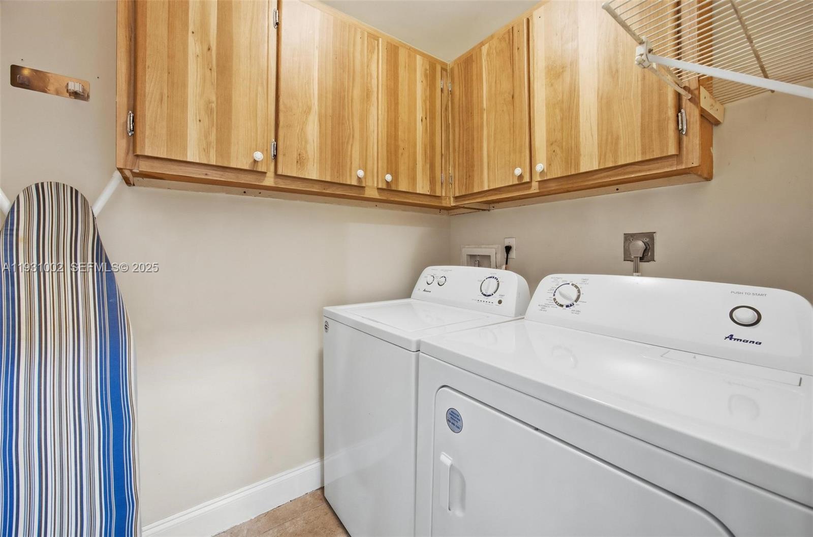 11731 Southwest 112th Terrace Miami, FL 33186 - Photo 17 of 41 a utility room with dryer and washer