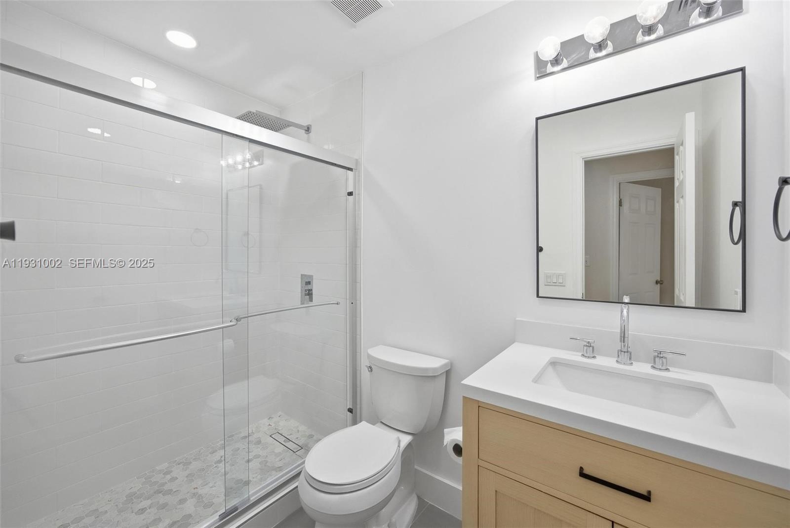 11731 Southwest 112th Terrace Miami, FL 33186 - Photo 21 of 41 a bathroom with a sink a toilet and shower