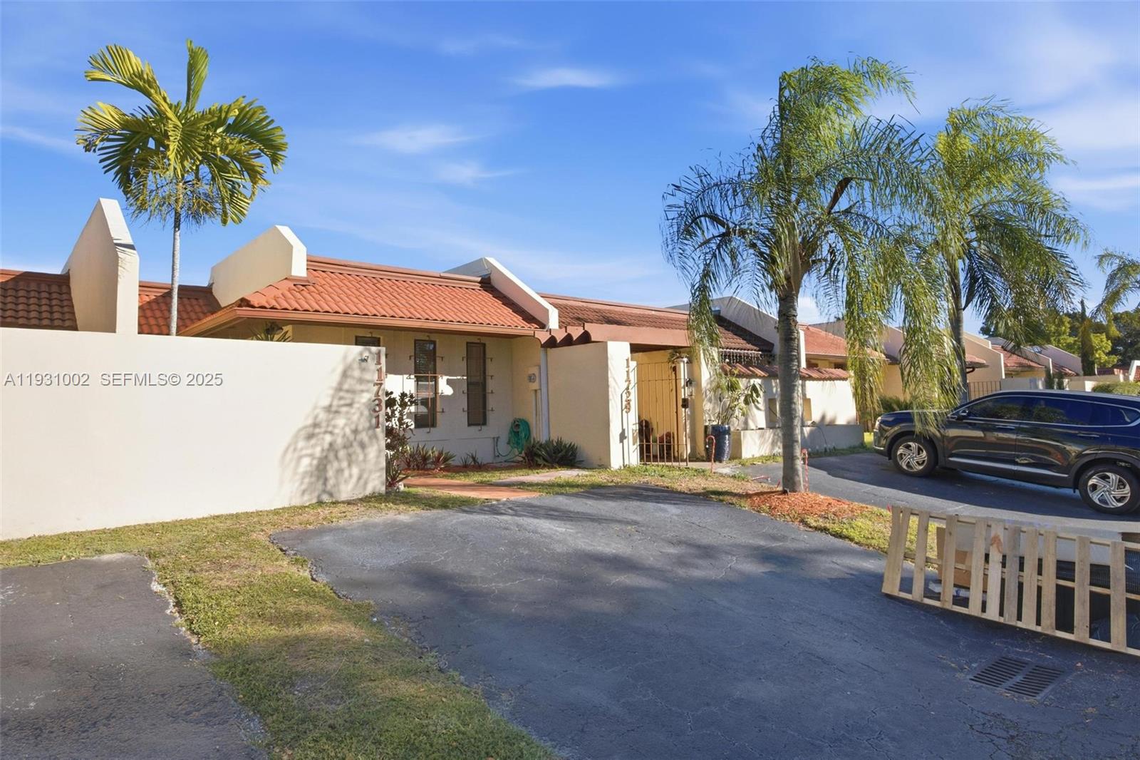 11731 Southwest 112th Terrace Miami, FL 33186 - Photo 3 of 41 a front view of a house with balcony