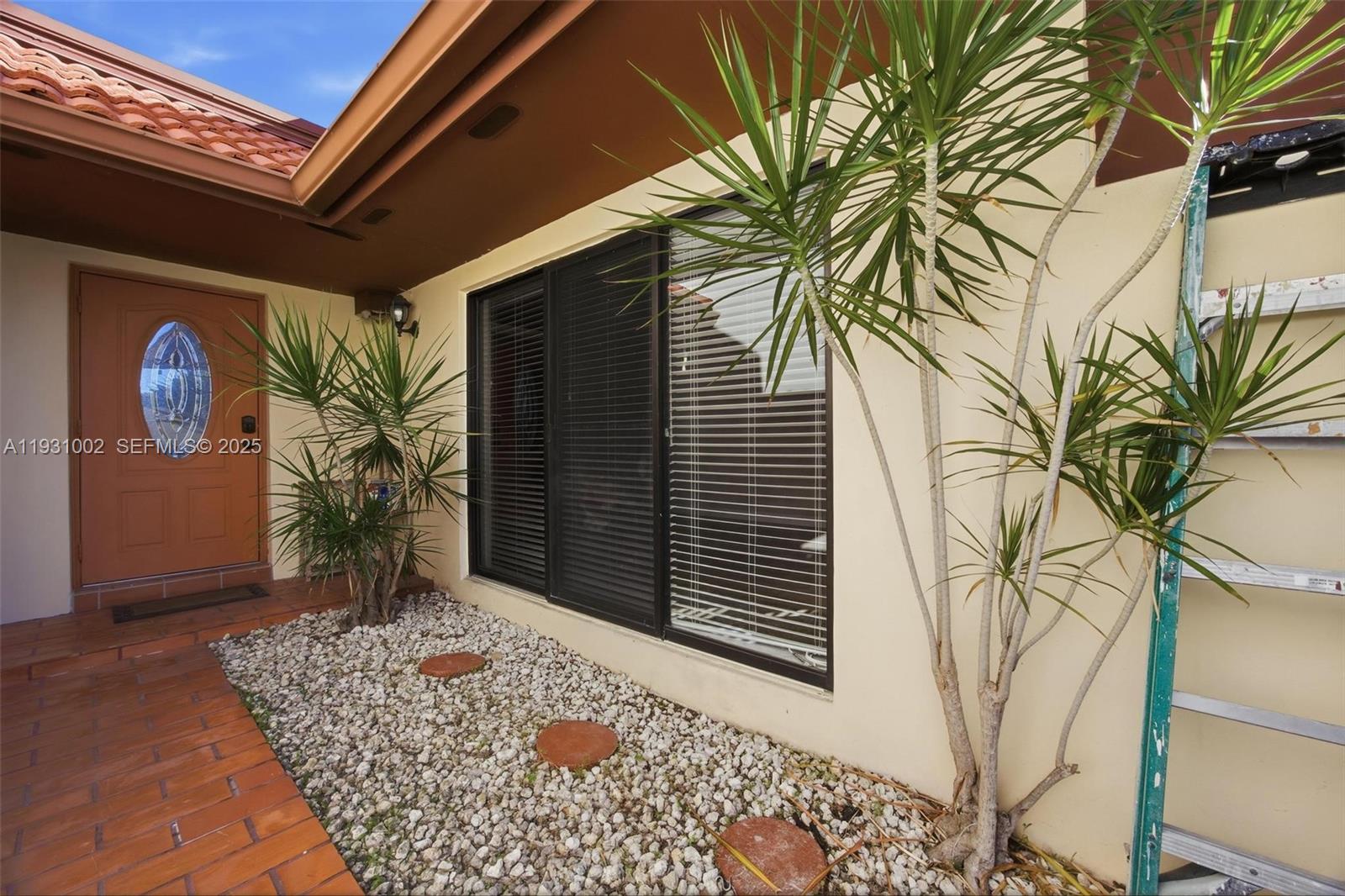 11731 Southwest 112th Terrace Miami, FL 33186 - Photo 4 of 41 a front view of a house
