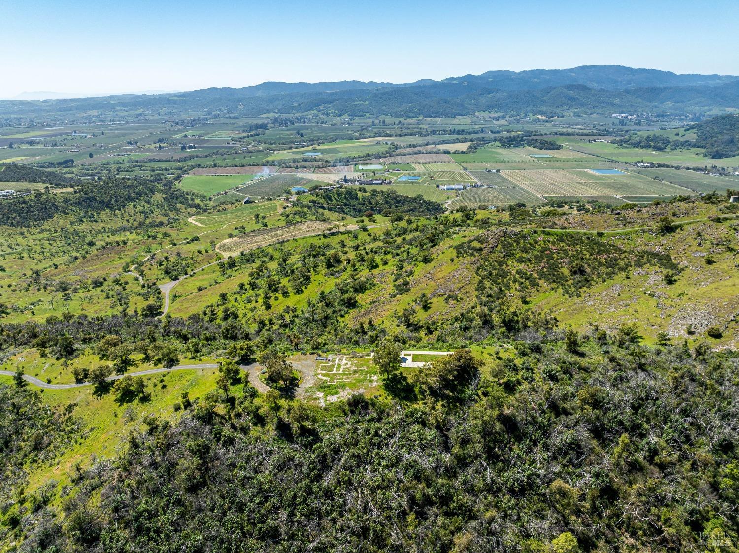2077 Soda Canyon Road Napa, CA 94558 - Photo 26 of 26 a view of a lush green hillside and houses