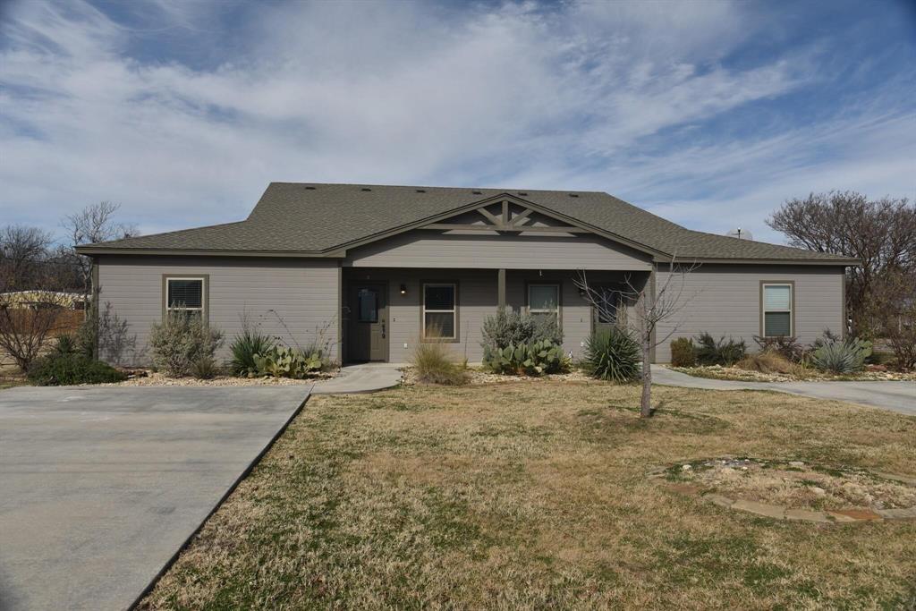 101 Capps Street, Unit B Rio Vista, TX 76093 - Photo 1 of 17 front view of a house with a yard