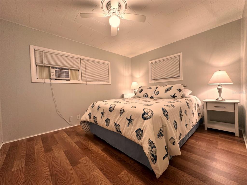 1600 Old Coachman Rd., Unit 816 Clearwater, FL 33765 - Photo 18 of 26 a bedroom with bed and a window