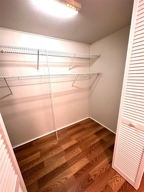 1600 Old Coachman Rd., Unit 816 Clearwater, FL 33765 - Photo 19 of 26 a view of a room with racks on the wall