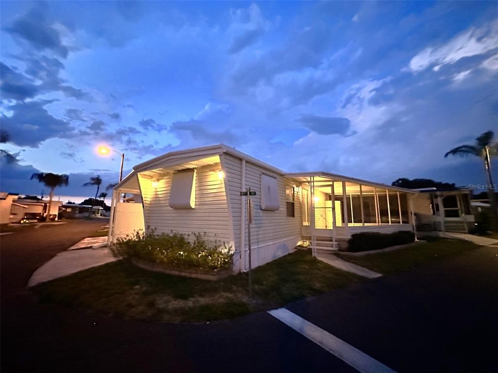 1600 Old Coachman Rd., Unit 816 Clearwater, FL 33765 - Photo 2 of 26 a view of back yard of the house