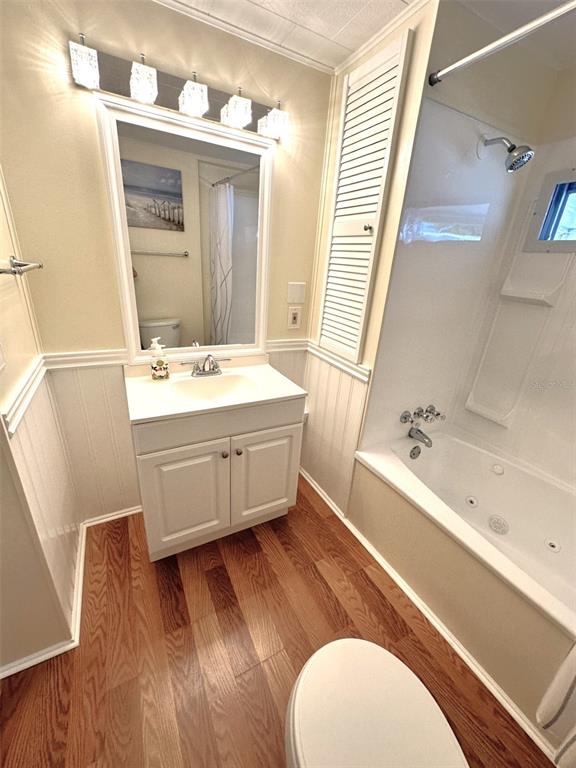 1600 Old Coachman Rd., Unit 816 Clearwater, FL 33765 - Photo 21 of 26 a bathroom with a sink and a mirror
