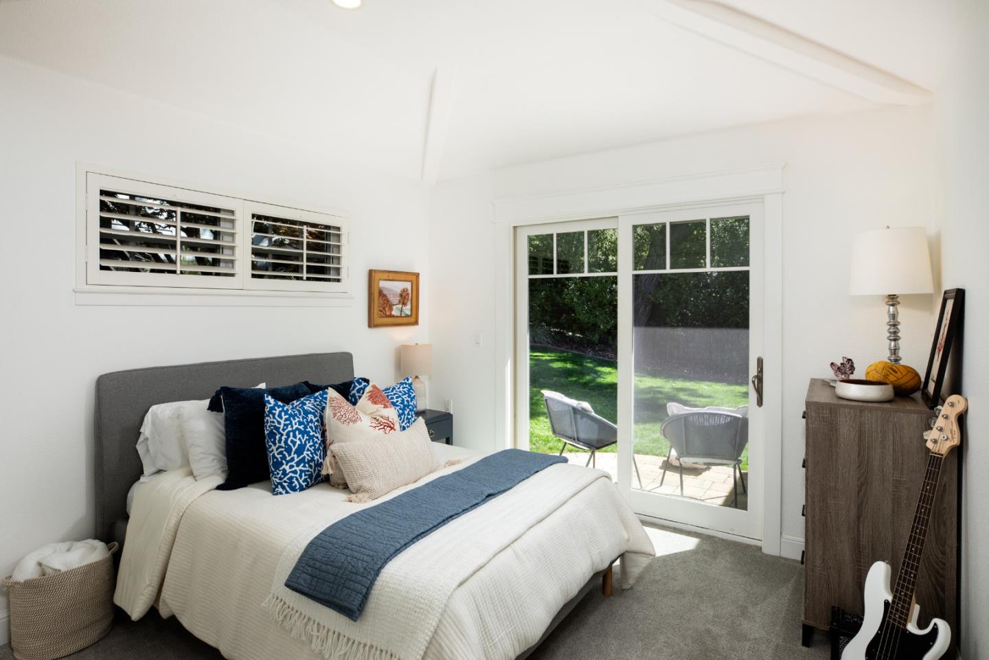 63 Ridge Court Woodside, CA 94062 - Photo 16 of 31 a bedroom with a bed and glass window